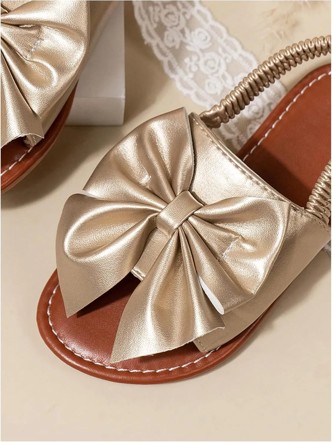 GORGLITTER Girl's Gold Bow Tie Flat Sandals Metallic Open Toe Ankle Strap Cute Slide Sandals Vacation Shoes